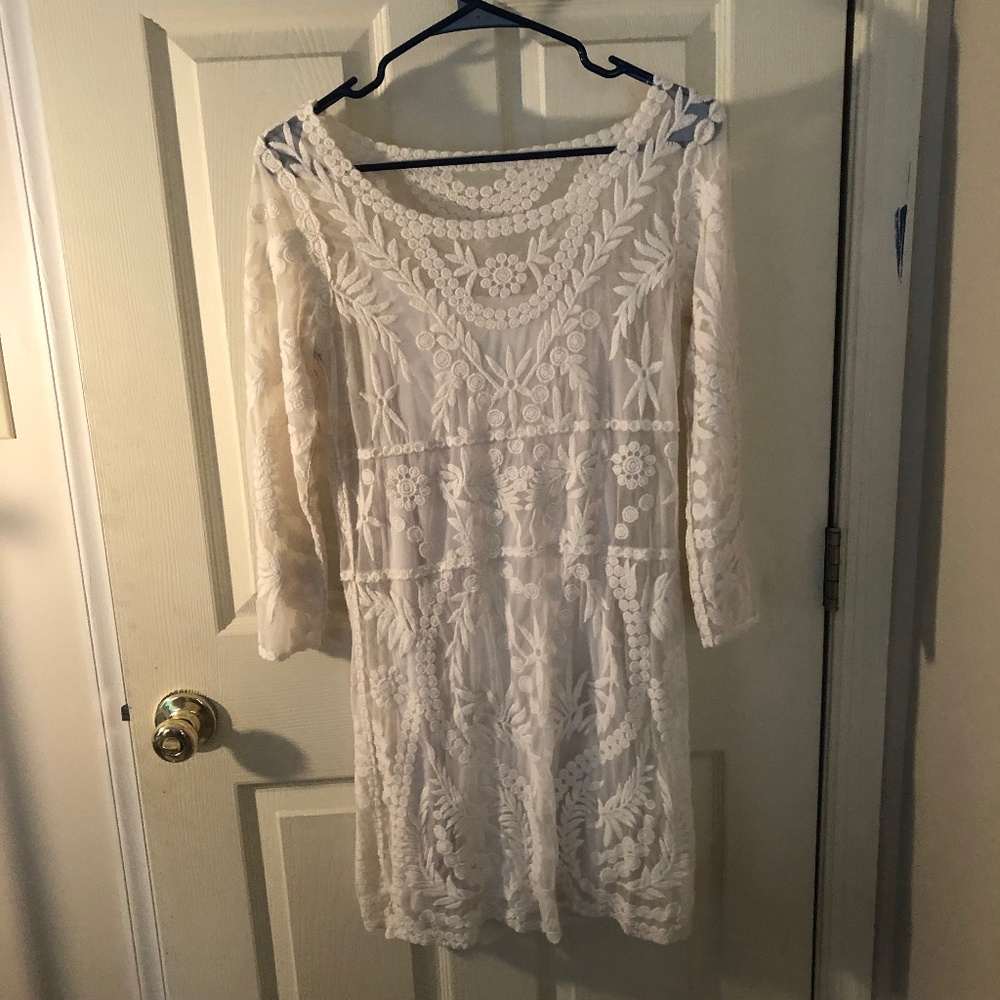 Embroidered body con mini dress